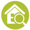 Green and white icon of a house with a magnifying glass